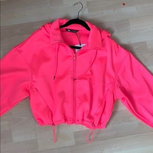 Bright pink cropped bomber jacket